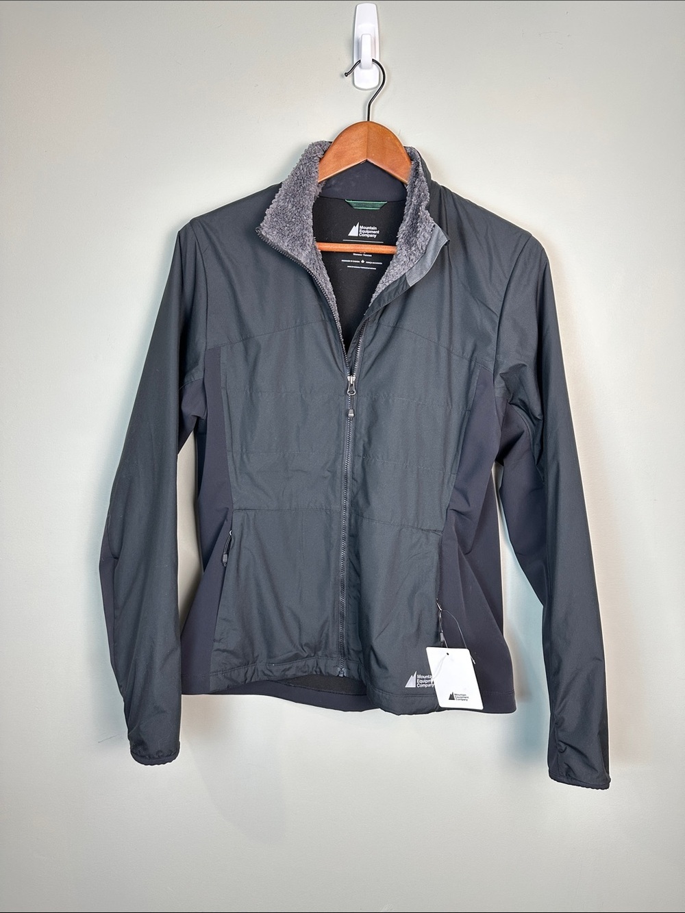 Mountain Equipment Company light hiking jacket fleece black zip up pockets